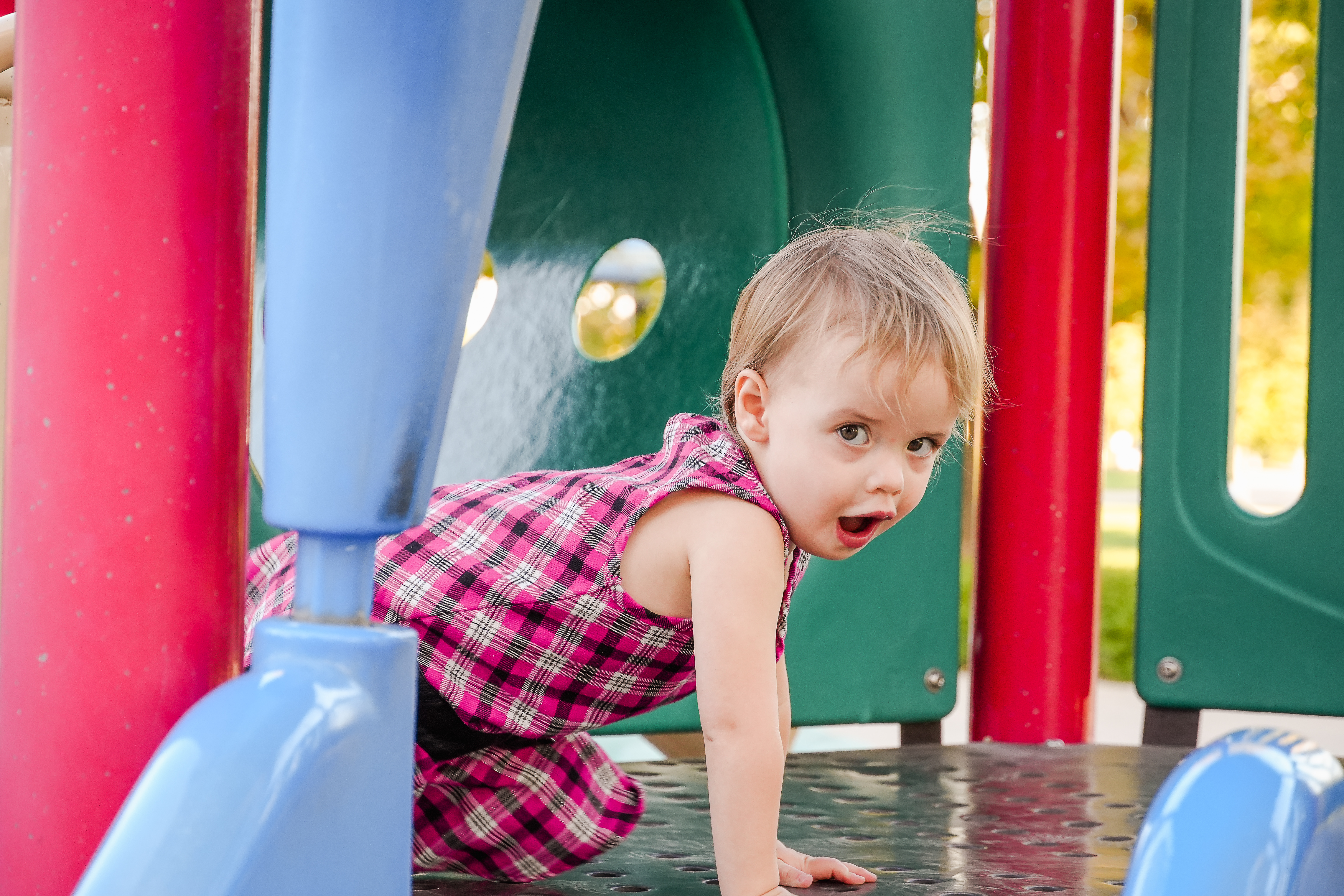 Sweet girl playing during photo shoot with Ginger E
