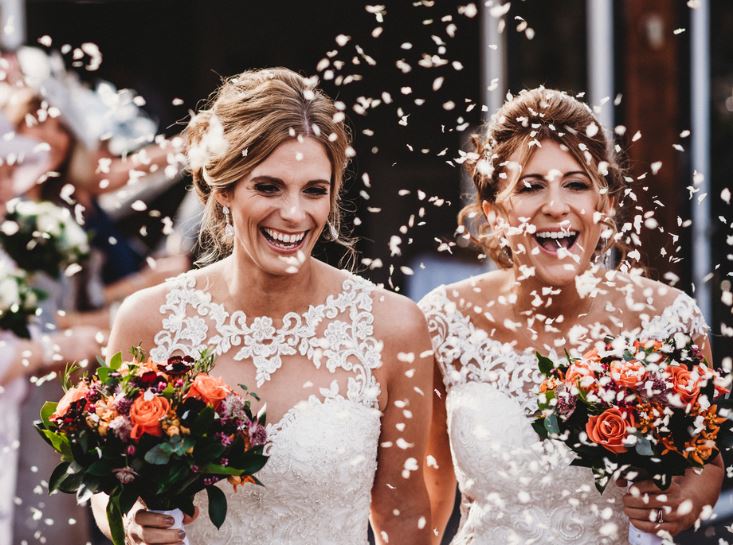 Happy brides in happiest day of their life.